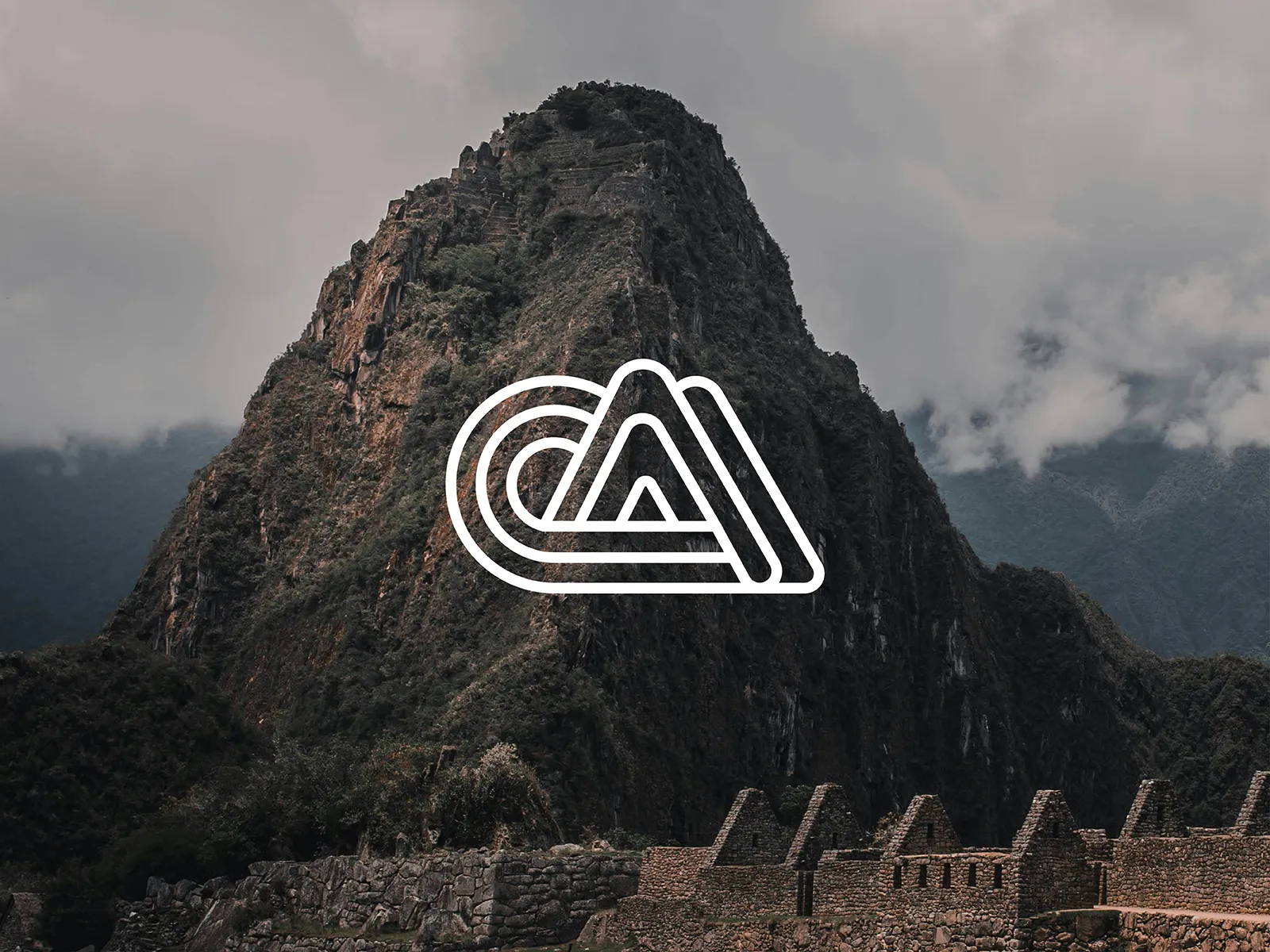 Logo for an agricultural business. The logo has a mountain in the back